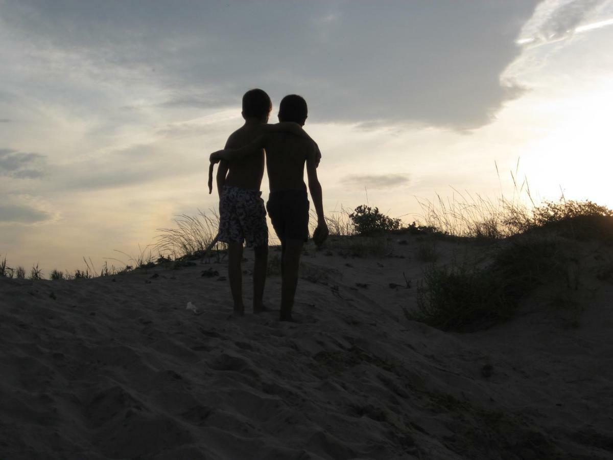 Hello Piles Beach Javier Luaran gambar